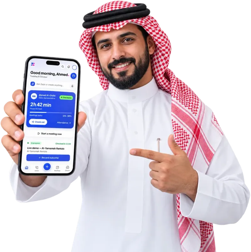 A sales rep pointing at the Zaps app on his phone